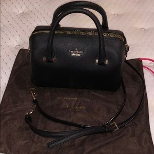 small, black Kate Spade purse
